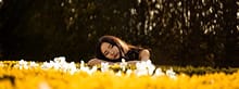a girl spending time in flowers