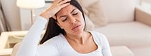 a woman suffering from headache