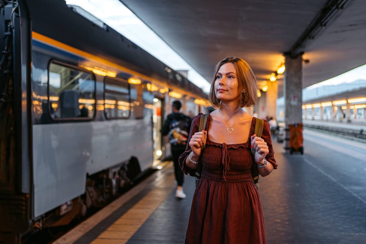 a woman at train station
