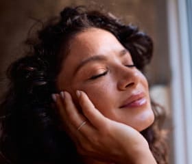 a woman with a serene expression