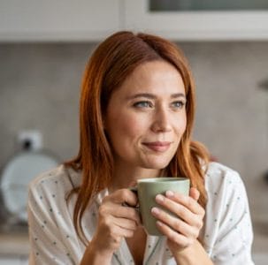 woman holding a mug