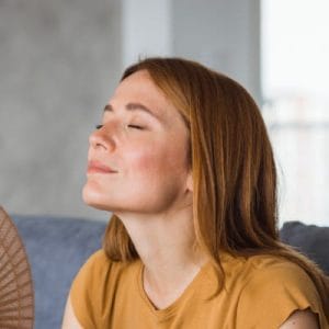 woman with her eyes closed